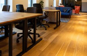 Office workspace showing laminate flooring