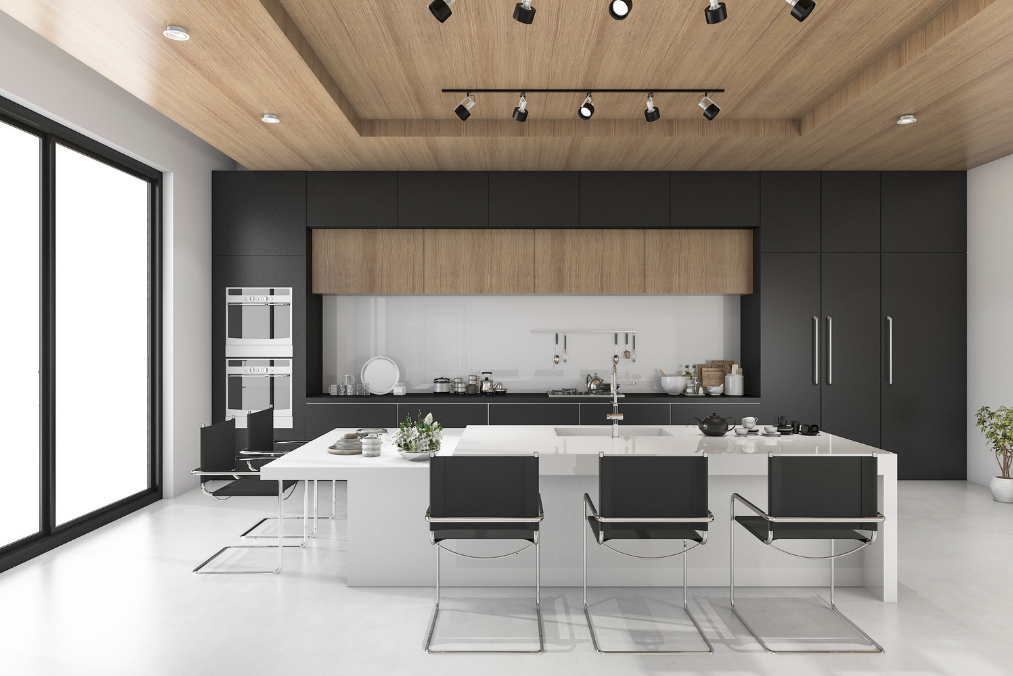 A kitchen space with a suspended ceiling