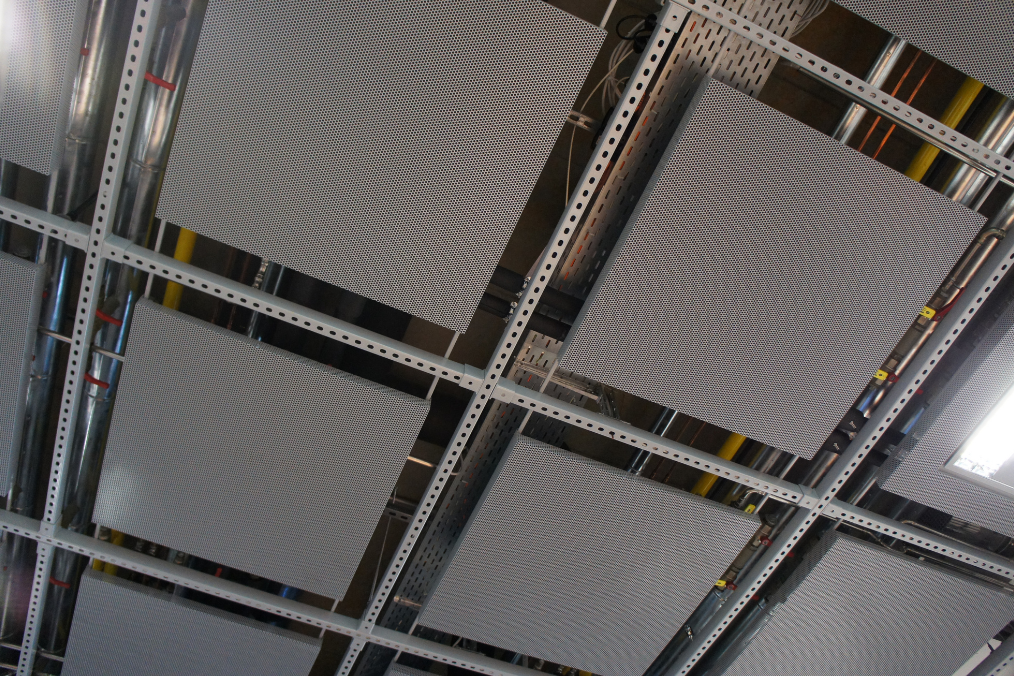 A suspended ceiling using mental tiles
