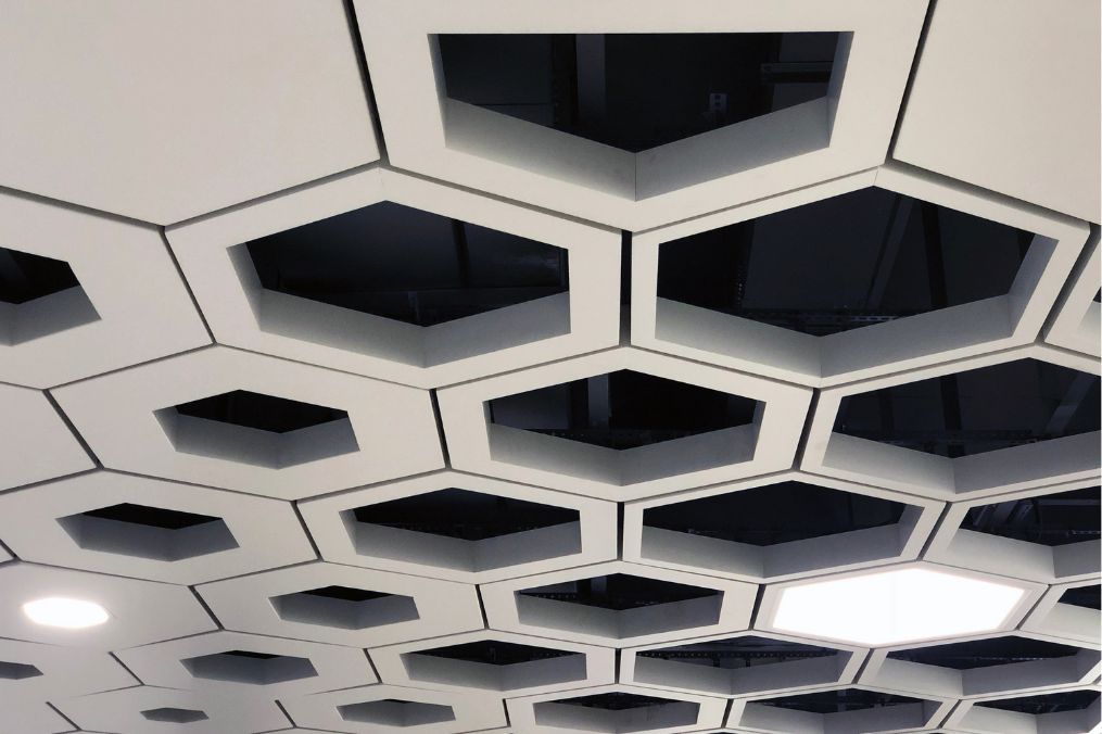A suspended ceiling made in with hexagonal tiles