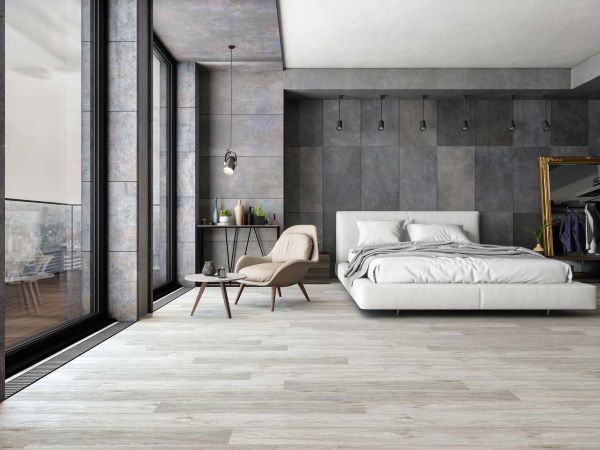 Bedroom with luxury vinyl tiles with wood pattern