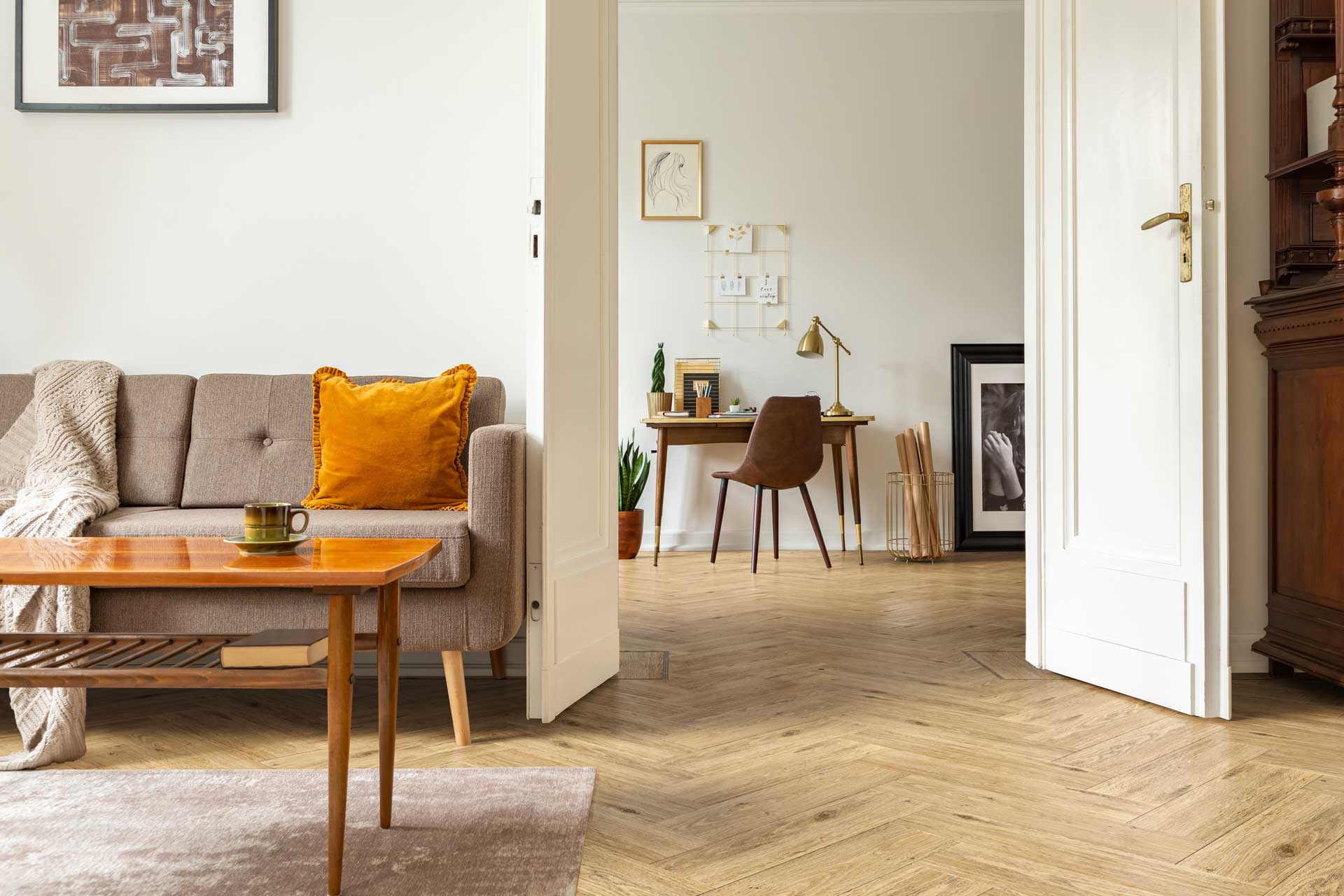 a living space with Ambiance herringbone flooring