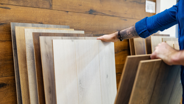 Someone looking through sample LVT